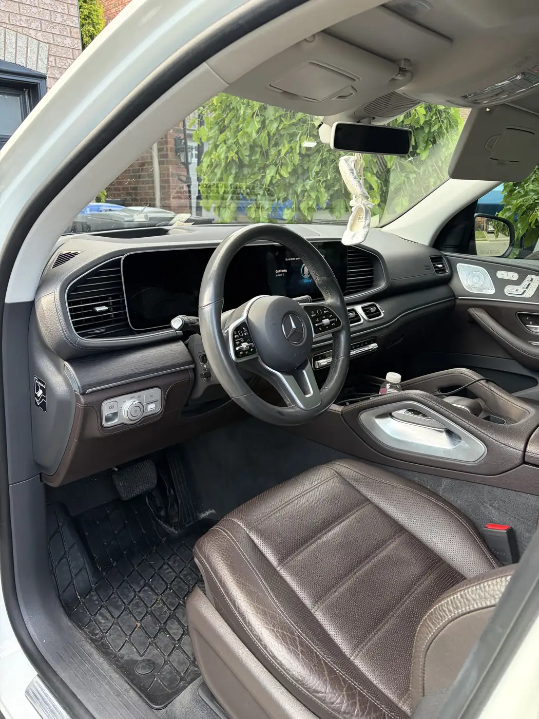 Mercedes GLE interior before detailing — dusty mats and dull leather